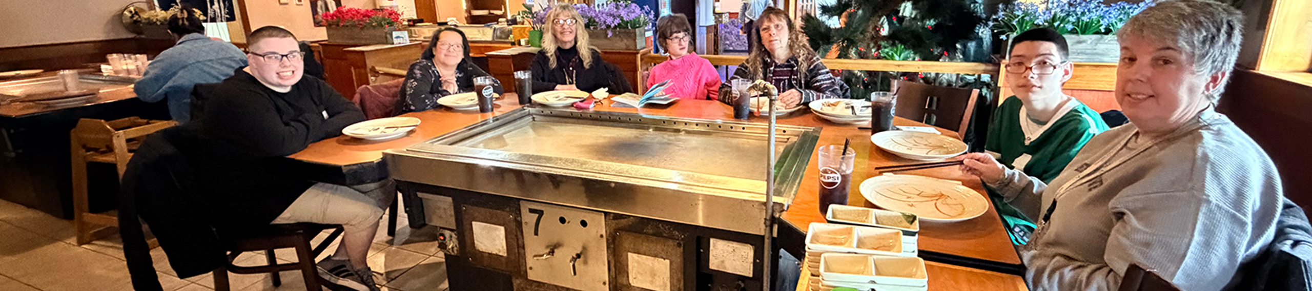 Photo of a group out to eat at a restaurant